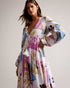 ROZLYN-Swimwear-Get ready to turn heads at the beach with the gorgeous ROZLYN cover-up. Our spliced floral print catches the eye, while the deep V-neck and floaty silhouette bring plenty of elegance. With long sleeves and a gathered waist with tassels, this cover-up is both stylish and comfortable. Bring on holiday season.By choosing Ted Baker cotton products, you're supporting our investment in the Better Cotton Initiative's mission. This product is sourced via a system of mass balance and therefore may no